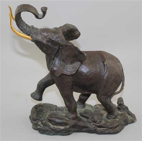 A 20th century patinated bronze elephant, 9.5in.